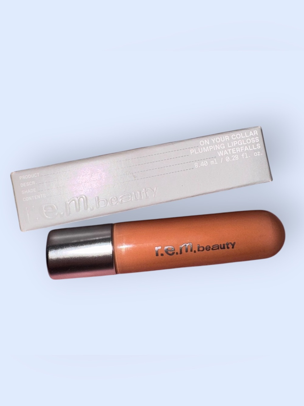 r.e.m beauty plumping lip gloss - shade waterfalls